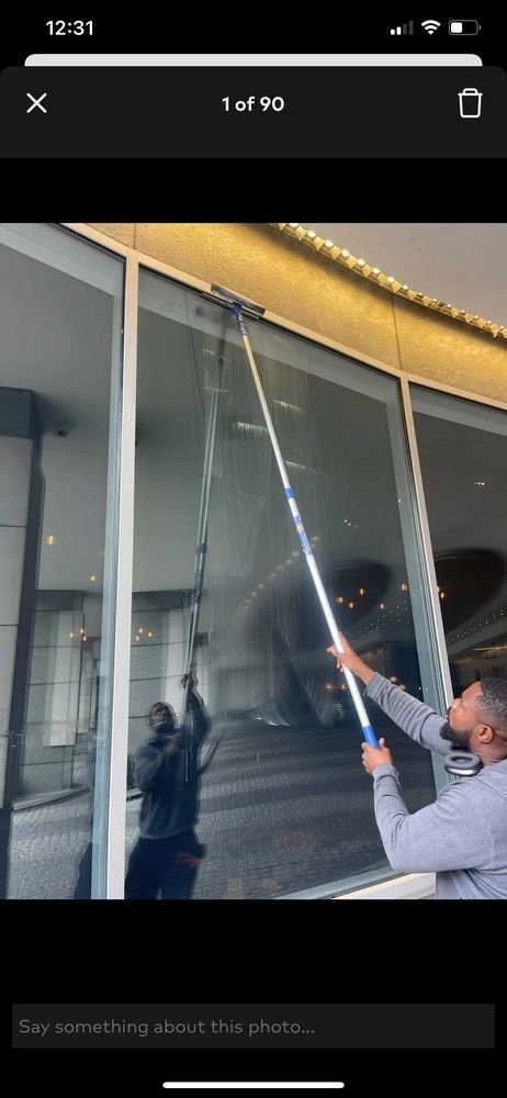 Glass facade cleaning on a modern building