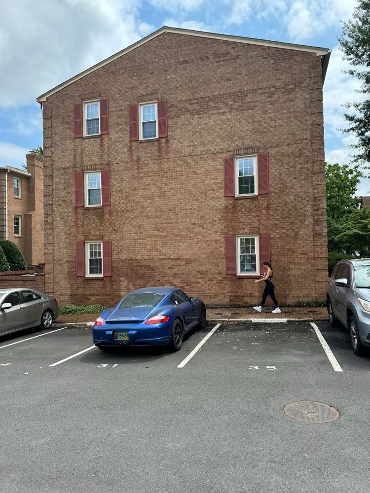 Exterior of a brick apartment building maintained by our team